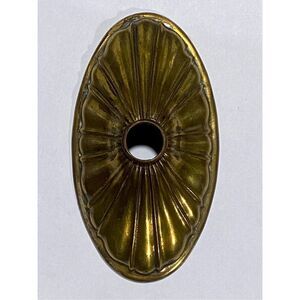 vintage brass stamped fluted oval sconce backplate
